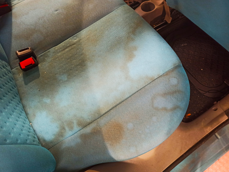 Clean Car Upholstery with steam on a seat